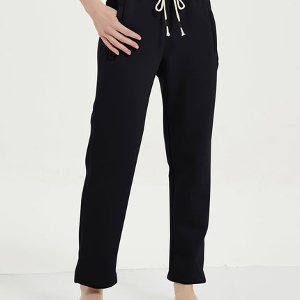 Black Gihuo Women's Sherpa Lined Sweatpants, front view on model