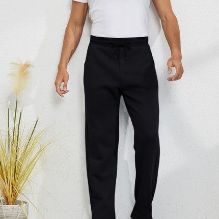 Black Gihuo Men's Sherpa Lined Sweatpants, front view on model