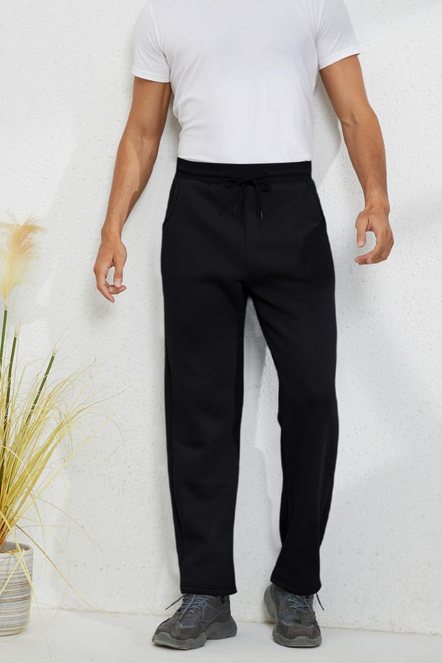 Black Gihuo Men's Sherpa Lined Sweatpants, front view on model